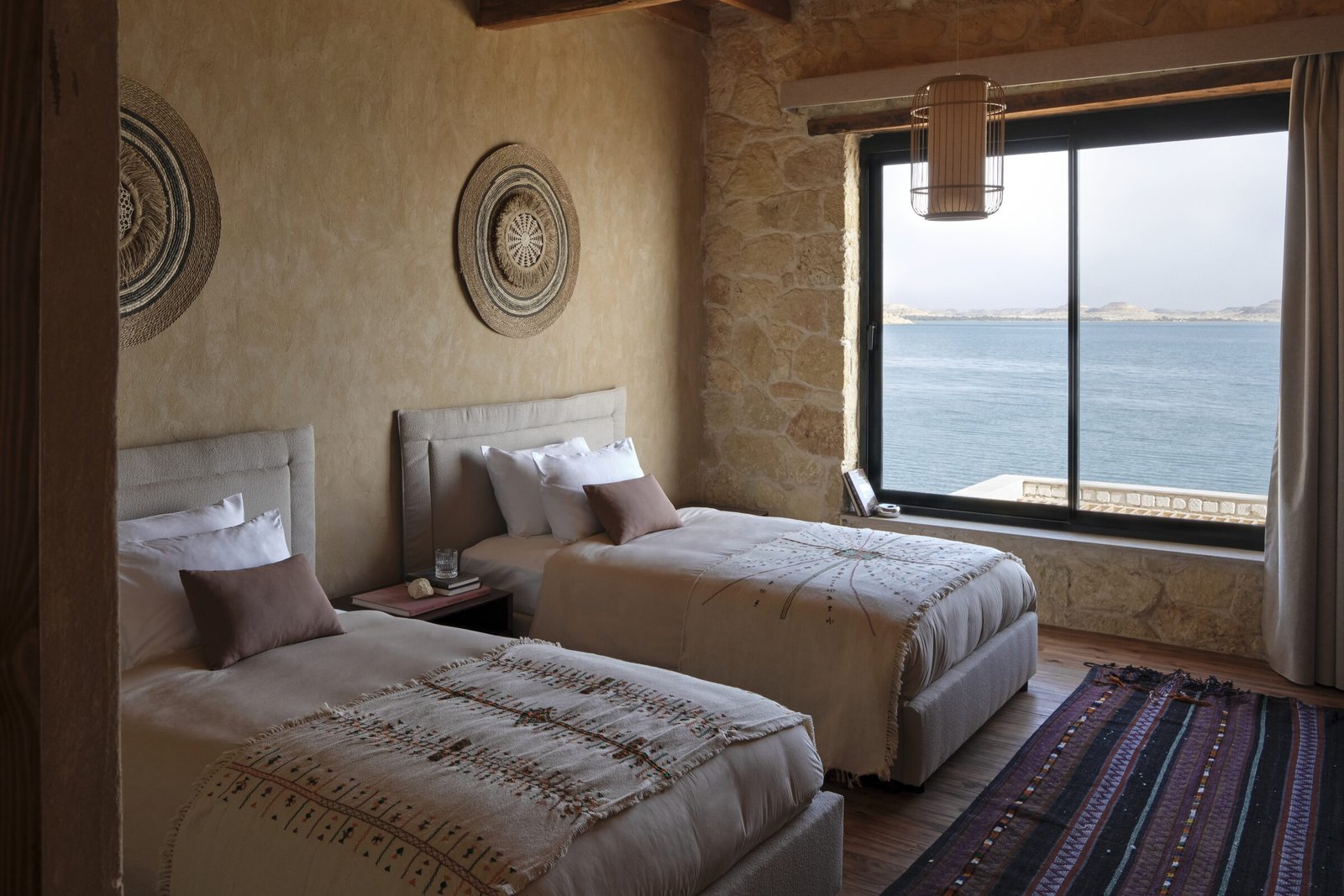 Bedroom with stone walls and window seat